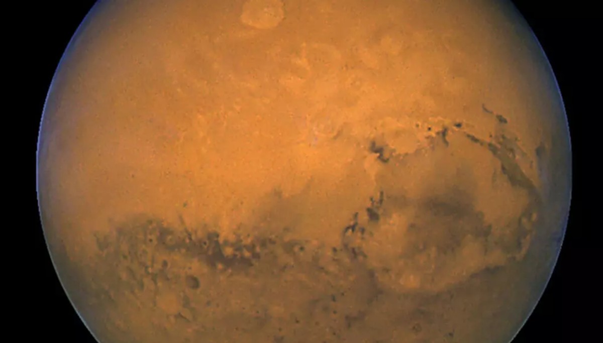 Nasa descobre 'super-Terra' a 154 anos-luz com luzes misteriosas no espaço Foto de arquivo tirada em 27 de agosto de 2003 pelo Telescópio Espacial Hubble da NASA mostra Marte fotografado minutos após a maior aproximação do planeta à Terra em quase 60.000 anos (Foto: AFP)